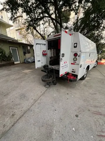 Magnet Plumbing service vehicle on-site for Water Heater Repair in Lavers